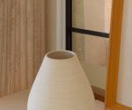 Simple ceramic vase with plain pattern - Image 2